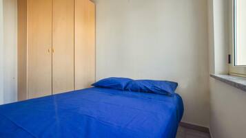 1 dormitorio y ropa de cama