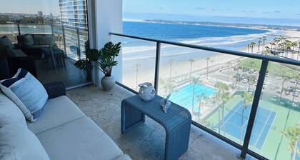 Beach and city views in condo with backyard access to beach and walkable town.