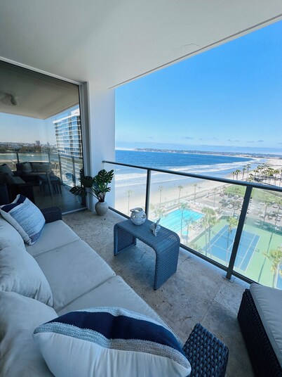 Beach and city views in condo with backyard access to beach and walkable town.