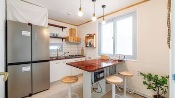 Fridge, microwave, cookware/dishes/utensils
