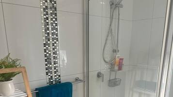 Shower, towels, soap, shampoo