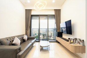 Classic Apartment, City View | Living area - The Marq Angia - Signature Suite (Ho Chi Minh City)