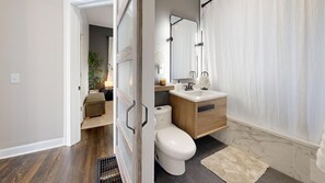 Jetted bath, hair dryer, towels, soap