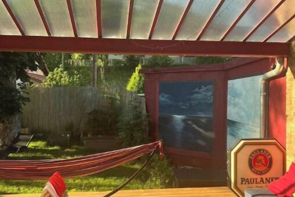 Terrasse couverte et son coin détente