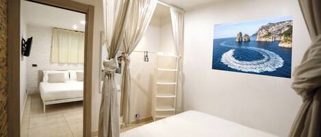 2 bedrooms, desk, iron/ironing board, travel crib