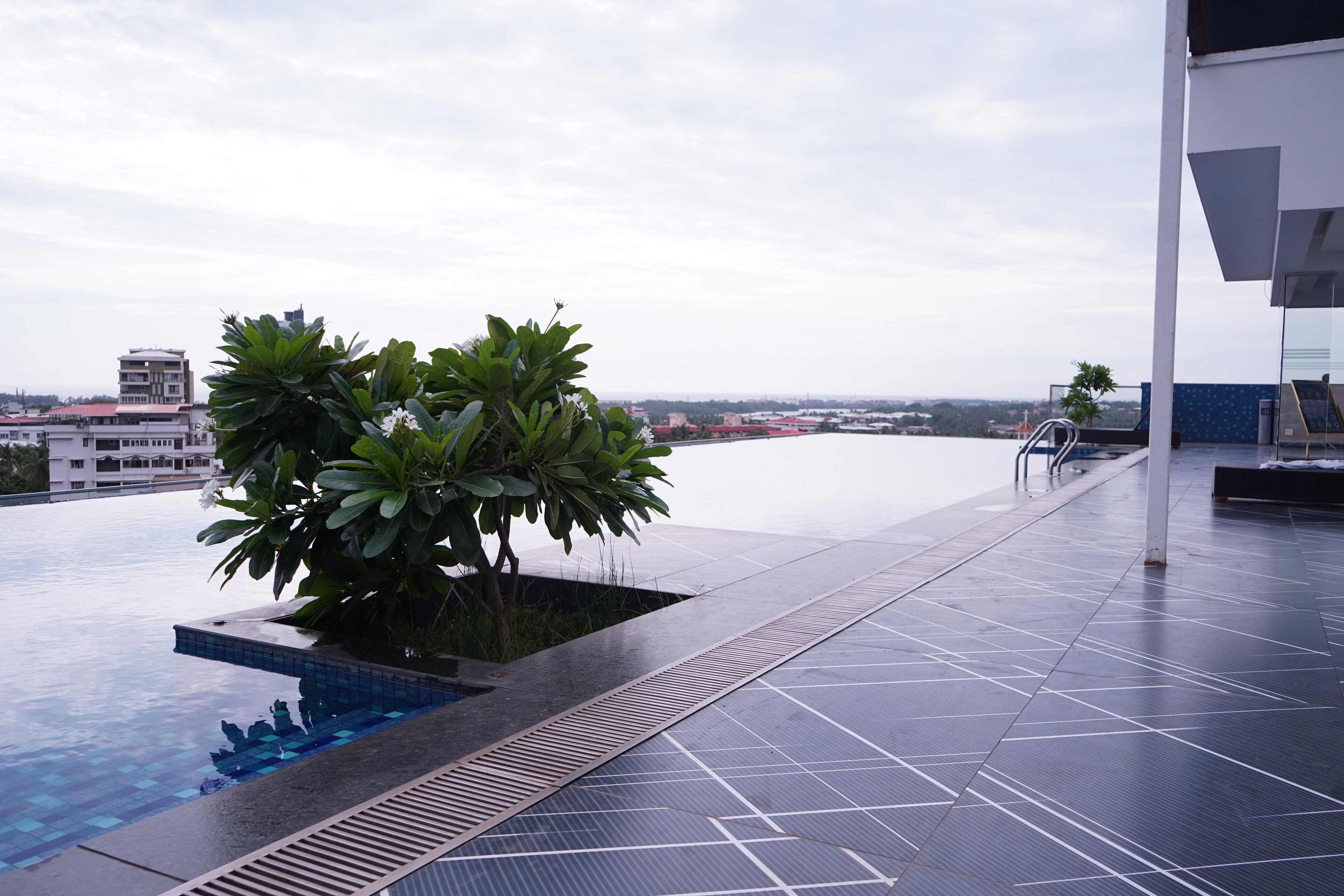 Outdoor pool, open 7:00 AM to 7:00 PM, pool loungers