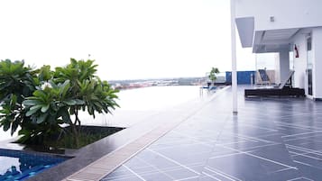Outdoor pool, open 7:00 AM to 7:00 PM, sun loungers