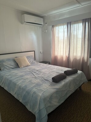 2 dormitorios, tabla de planchar con plancha, wifi gratis y ropa de cama