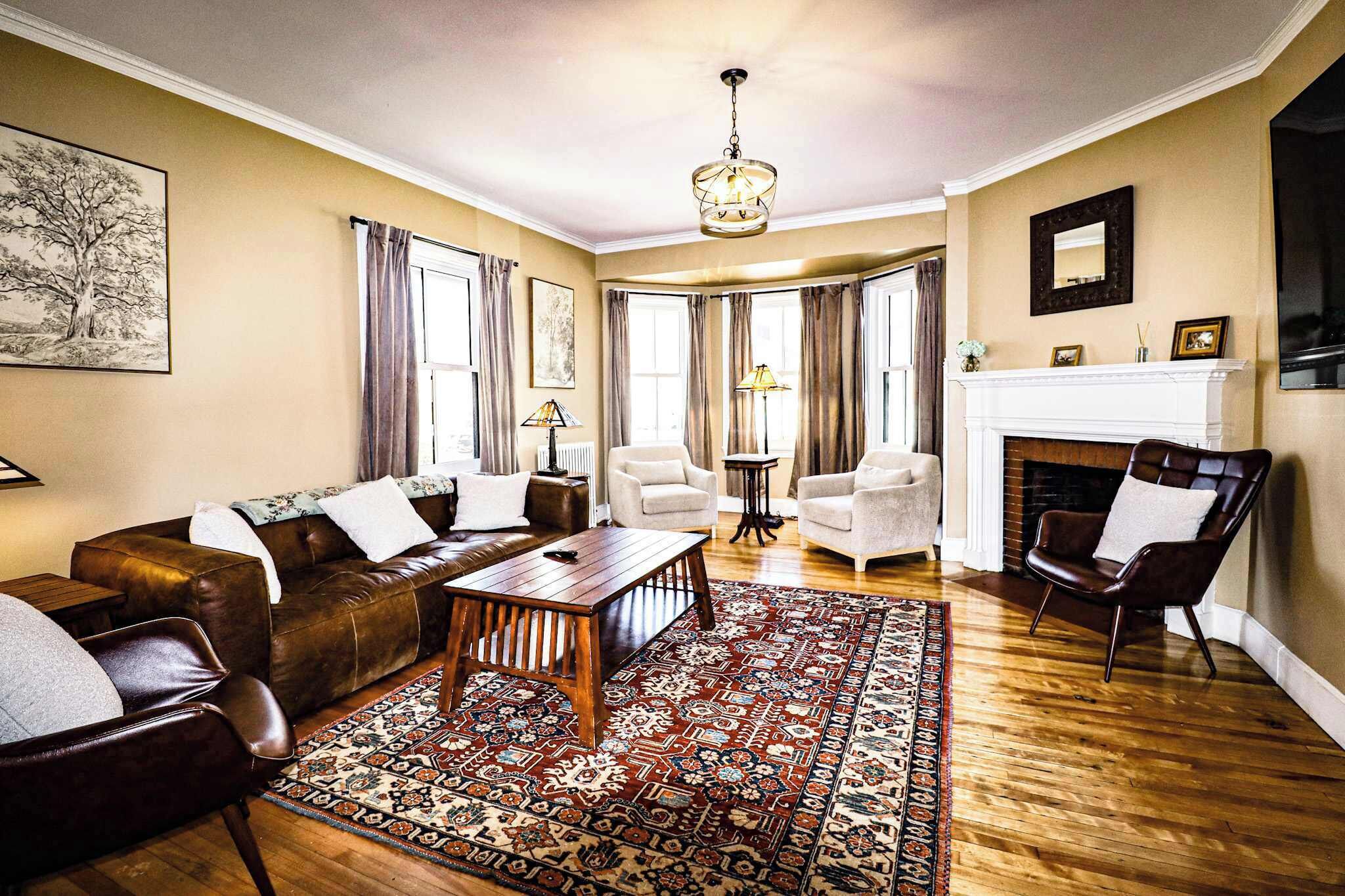 TV, fireplace, books, offices