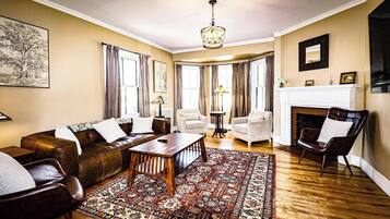 TV, fireplace, books, offices