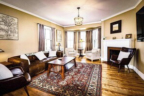 TV, fireplace, books, offices