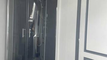 Shower, free toiletries, hair dryer, towels