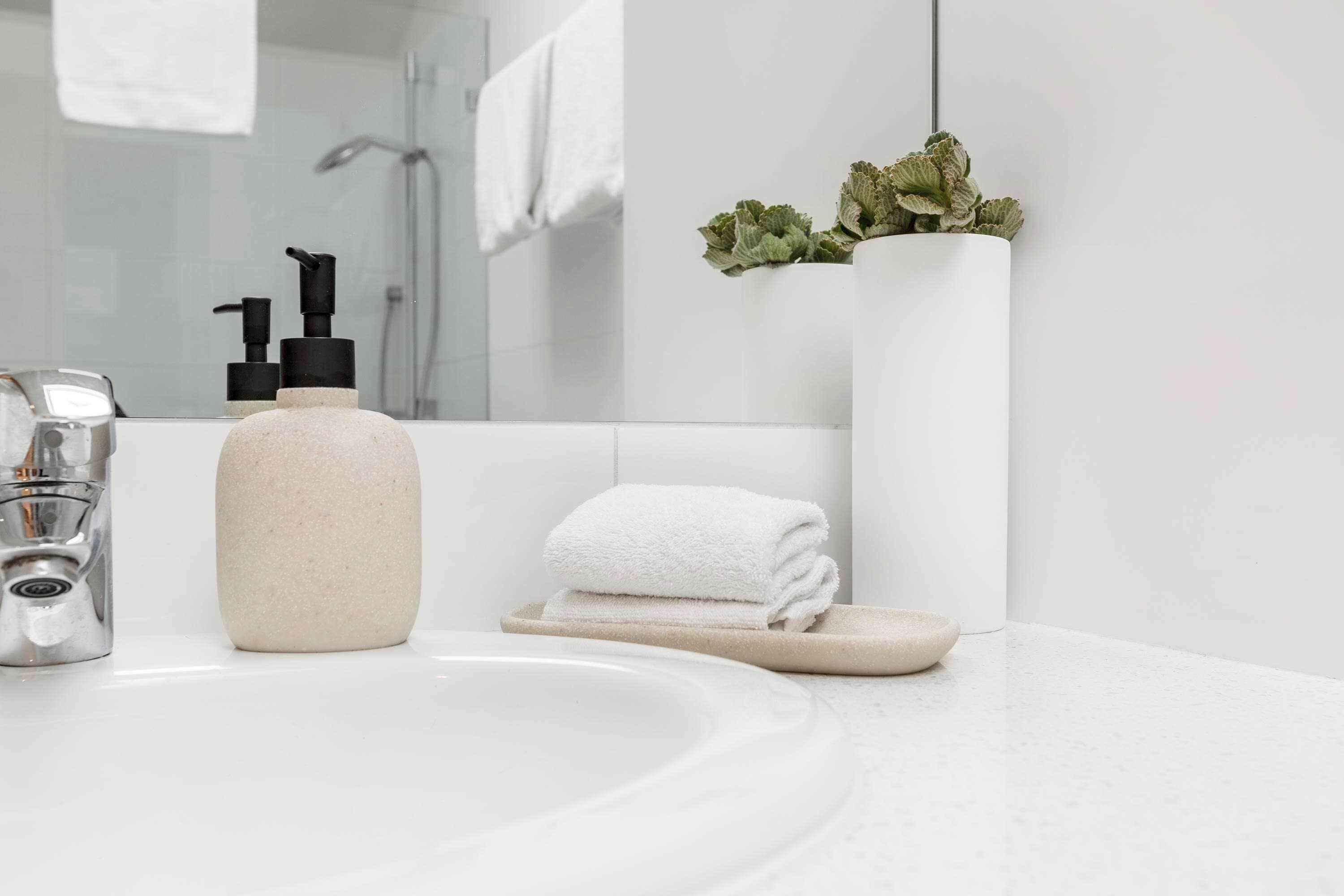 Shower, hair dryer, towels, shampoo