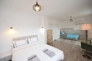 Habitación triple Confort, vista a la ciudad