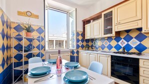 Coffee/tea maker, fridge, stovetop - Luce San Lorenzo, Cheerful 2 Br Apartment By Halldis (Rome)