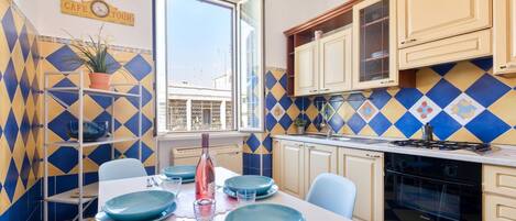 Fridge, stovetop, coffee/tea maker