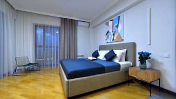 Family Apartment, Balcony | 1 bedroom, in-room safe, soundproofing, iron/ironing board