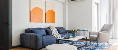 Family Apartment, Balcony | Living area | 52-cm Smart TV with digital channels