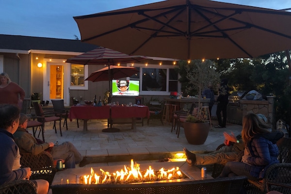 Outdoor Entertainment with fire pit and TV