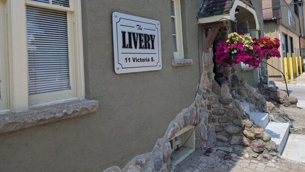 A building with a sign reading "The Livery 11 Victoria St." - The Livery (Brockton)