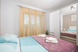 2 slaapkamers, een strijkplank/strijkijzer, wifi, beddengoed