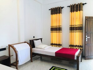 Habitación triple básica, vista al jardín