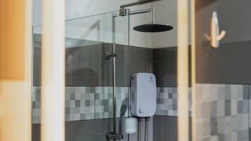 Shower, rainfall showerhead, towels