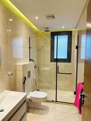 Shower, towels, soap, shampoo