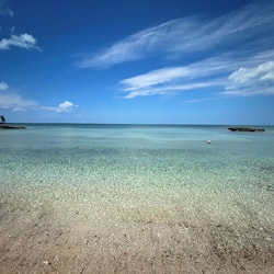 On the beach, sun-loungers, beach towels, snorkelling