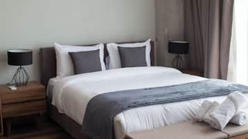 Family Room | Premium bedding, down comforters, pillowtop beds, laptop workspace