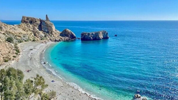 A coastal landscape with a clear blue sea, rocky outcrops, and a sandy beach. - 5 bedroom amazing home in Restabal (Restabal)