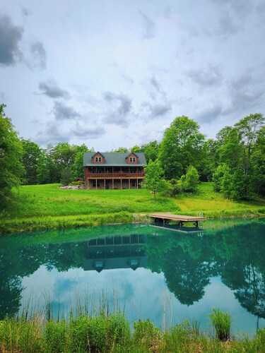 Cozy cabin in tranquil setting overlooking pond