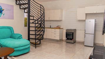 شقة حصرية - غرفتا نوم - بمنظر للمنتجع | مطبخ خاص | موقد طهي مسطح، مستلزمات طهي/أطباق/أوعية، مجمّد، مناشف ورقية