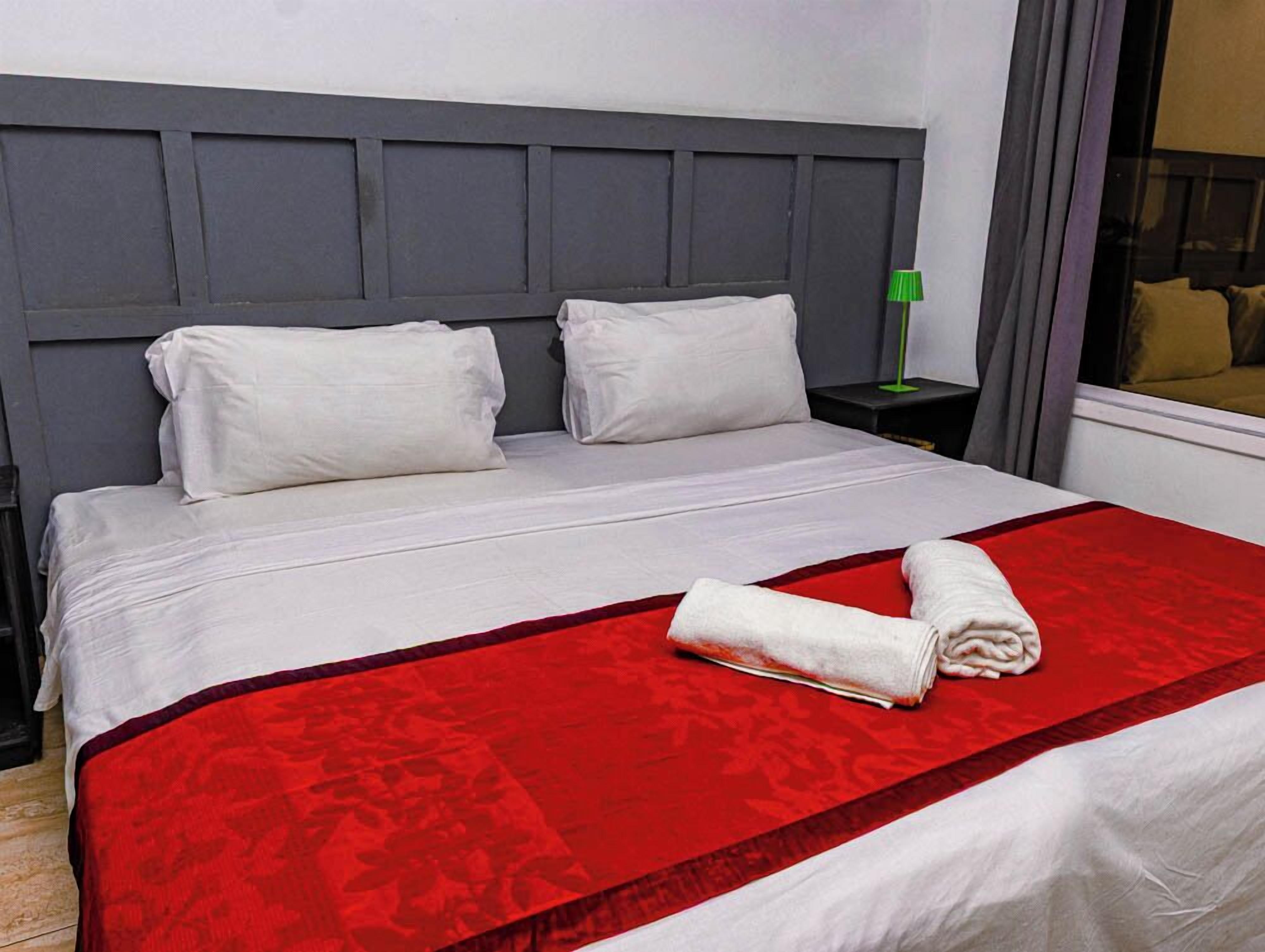 Basic Double Room, Pool View | Iron/ironing board, free cots/infant beds, free WiFi, bed sheets