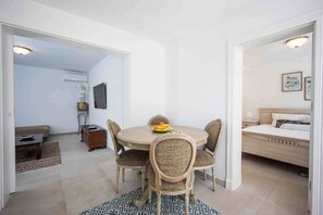 Deluxe Apartment, 1 Queen Bed, Pool View | Dining room - Boutique Guesthouse Sveti Petar (Solta)