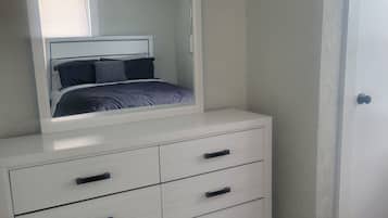 1 bedroom, desk, iron/ironing board, travel cot