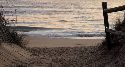 Stunning view of Lake Christine w/ a 3-min walk to Croatan beach!