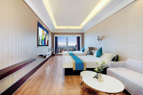 Hypo-allergenic bedding, desk, laptop workspace, blackout drapes