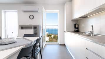 Apartment (Two Bedroom Apartment with Balcony) | Private kitchen | Fridge