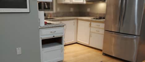 Full Kitchen with dishwasherand overhead Microwave
