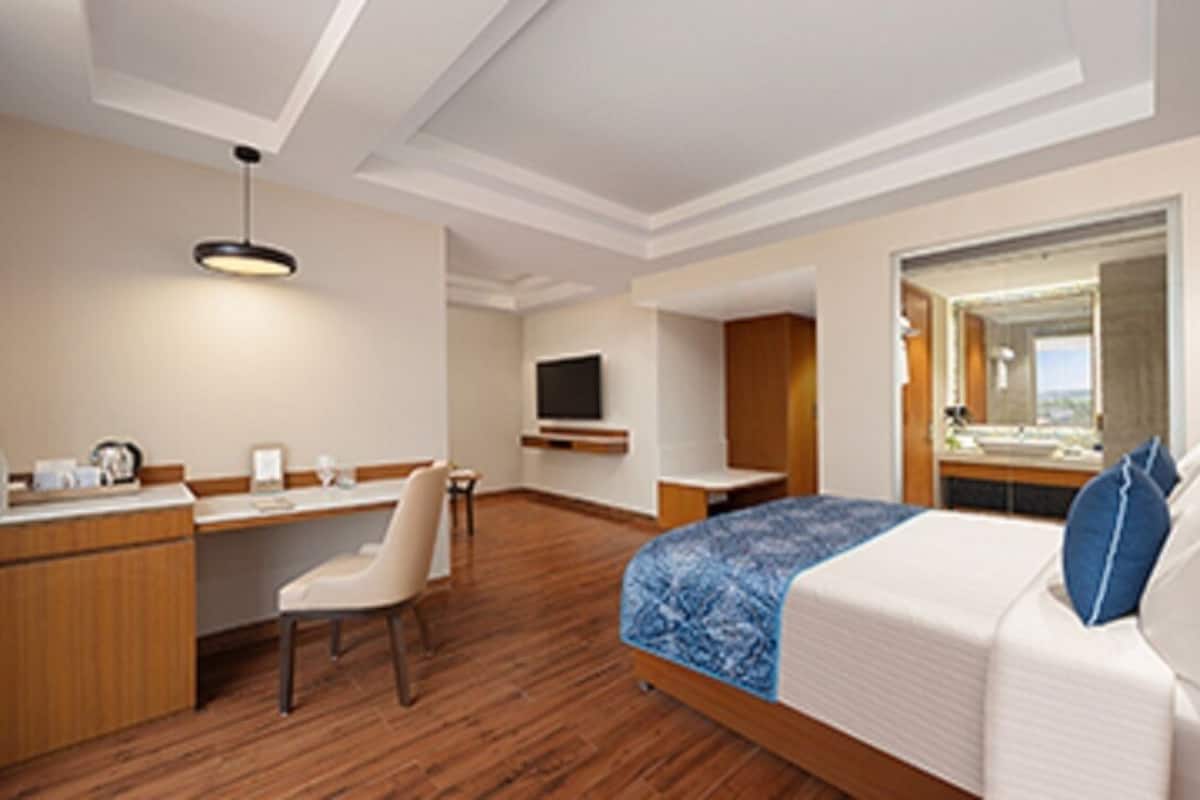 Premium bedding, down duvets, Select Comfort beds, minibar