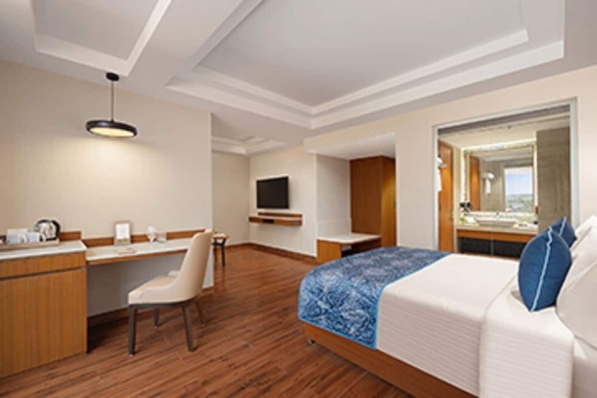 Premium bedding, down comforters, Select Comfort beds, minibar