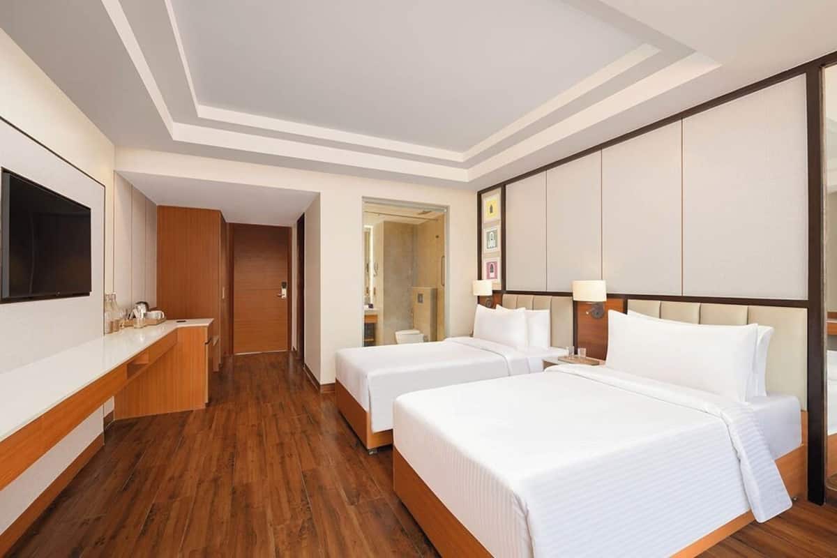 Premium bedding, down duvets, Select Comfort beds, minibar