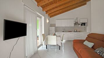 21-inch flat-screen TV with cable channels, TV