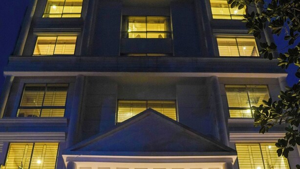 A hotel building with illuminated windows and a sign reading "Grand Vistana." - Grand Vistana (Dhaka)