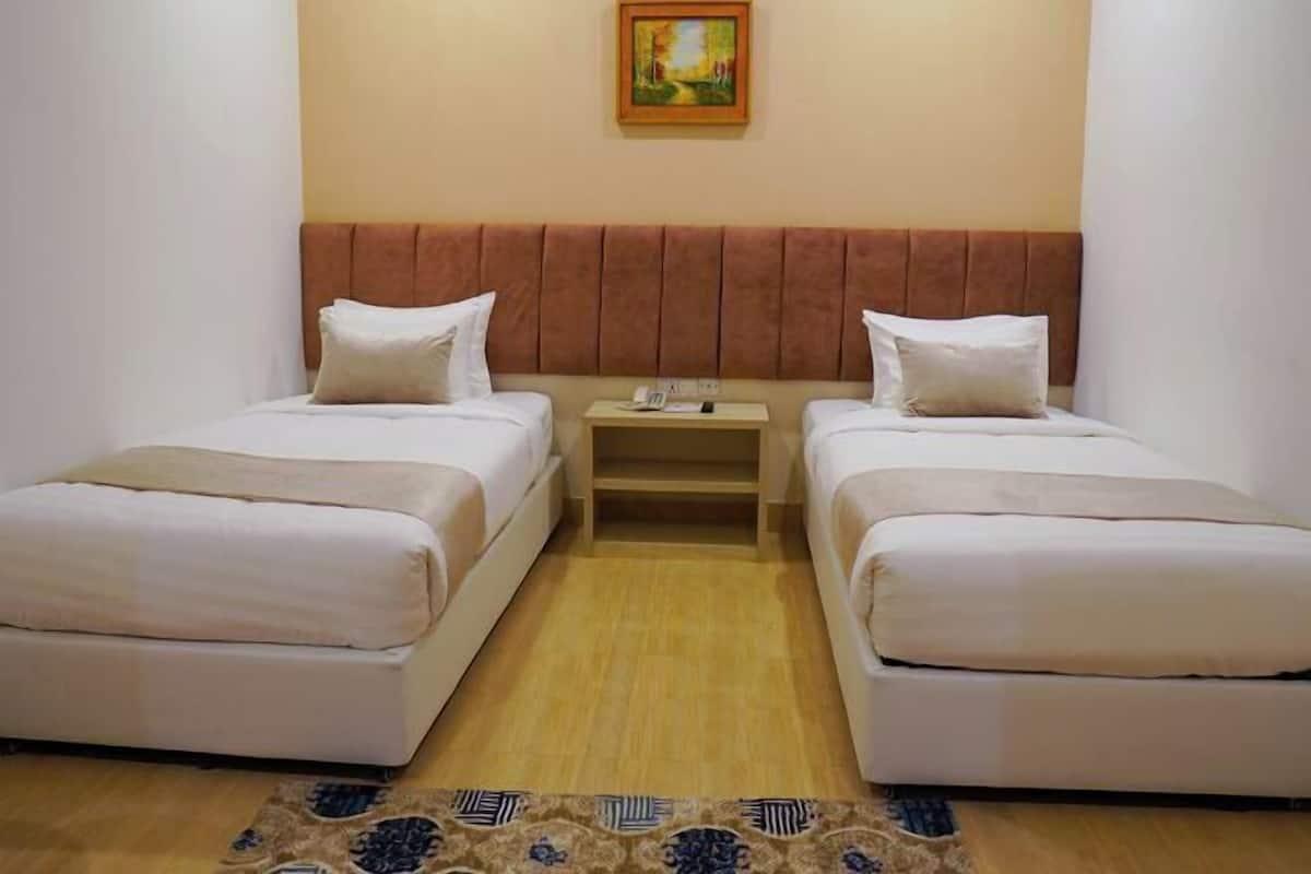 Premium bedding, pillowtop beds, minibar, desk