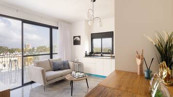 Appartement, balcon | Coin séjour | TV connectée de 60 pouces avec chaßnes numériques