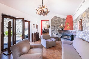 Standard House, Multiple Bedrooms, Mountainside (Casa Sant'Anna - In Garfagnana) | Living area | Flat-screen TV, fireplace, DVD player - Casa Sant'anna - In Garfagnana (Minucciano)