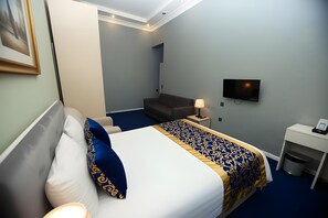 Family Room | 1 bedroom, minibar, individually furnished, desk - NH Nizami Hotel (Baku)