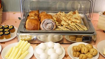 Dagelijks à-la-carte-ontbijt (USD 15 per persoon)